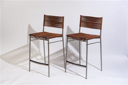 Tito Agnoli (1931 - 2012) Coppia di sgabelli acciaio e cuoio H. 103 cm Per...