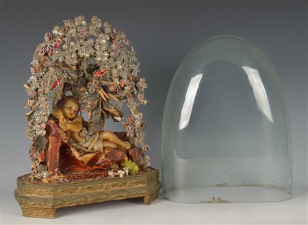 Arte del sec. XIX "Gesù Bambino" scultura in cera con decori floreali e...