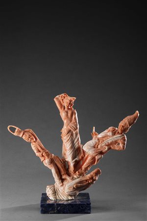 Statua in corallo raffigurante personaggi allegorici. Sec. XX. Base in quarzo...