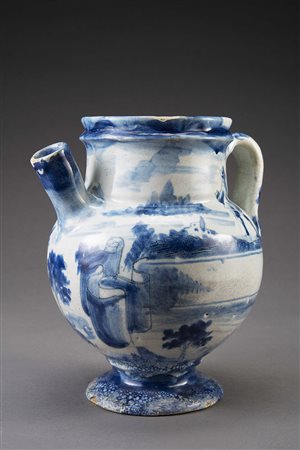 Versatoio farmaceutico in maiolica a ‘scenografia barocca’ in monocromia blu...