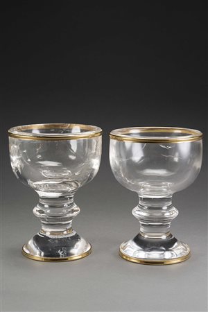 Coppia di calici in cristallo di rocca tornito con ghiere in oro 750. Orefice...