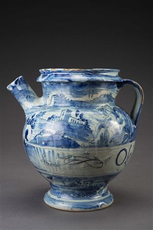 Versatoio farmaceutico in maiolica con decoro ‘a figuretti e paesaggini’ in...