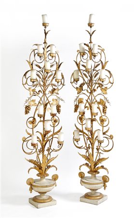  
Coppia di torciere 
 Cadauna cm: 240x65x35. 