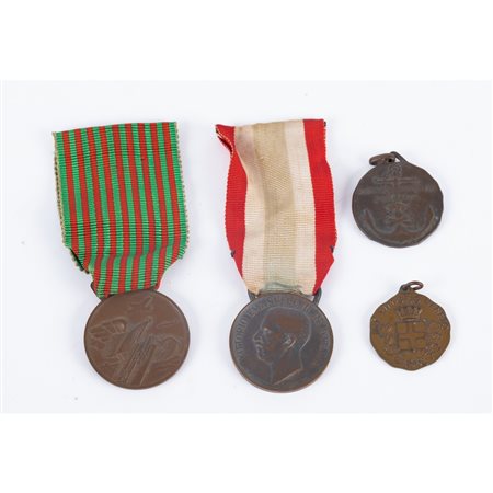 QUATTRO MEDAGLIE COMMEMORATIVE E AL MERITO