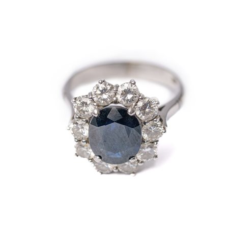 ANELLO in oro bianco 18 KT con brillanti e zaffiro