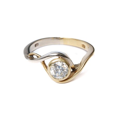 ANELLO in oro giallo e bianco 18 KT con brillante