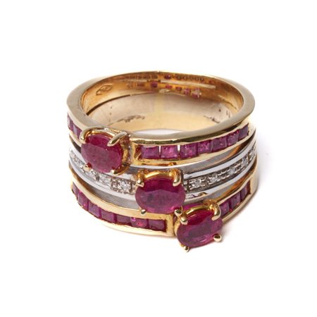 ANELLO in oro giallo e bianco 18 KT con brillanti e rubini