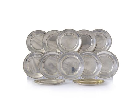 ARGENTI RECENTI DODICI PIATTINI IN ARGENTO, XX SECOLO, circolari con bordo...