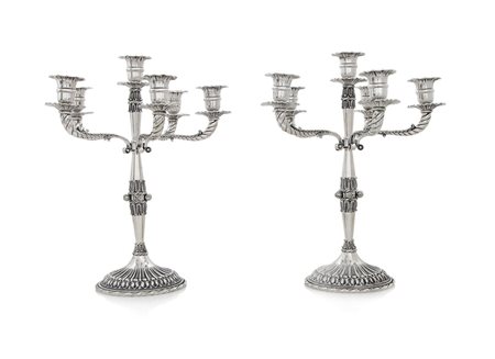 ARGENTI RECENTI COPPIA DI CANDELABRI IN ARGENTO, XX SECOLO, a sei fiamme su...