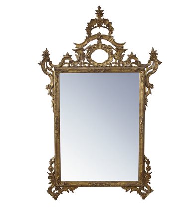 MOBILE DEL XX SECOLO SPECCHIERA IN LEGNO SCOLPITO E DORATO, XX SECOLO, in...