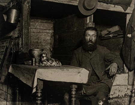 Jacob August Riis (1849 - 1914)  - Sabbath Eve in a Coal Cellar, Ludlow Street, 1890s