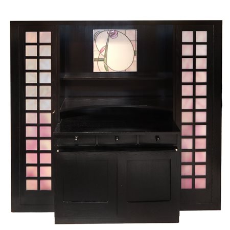 Charles Rennie Mackintosh per Cassina (Glasgow 1868 - Londra 1928)  - Credenza in frassino nero con vetro piombato con decoro floreale centrale, 1975
