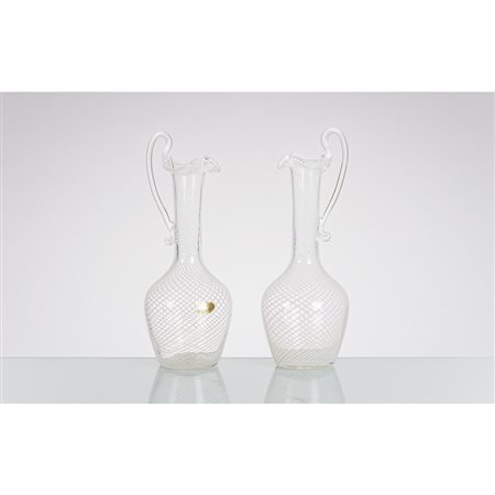 VENINI (Attr.le), Coppia di caraffe in vetro
