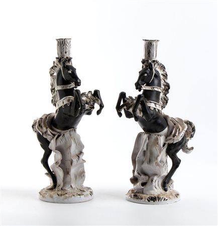 UGO ZACCAGNINI (Pistoia 1868 - Firenze 1937), Due candelabri a forma di cavallo rampante