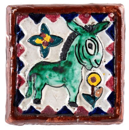GUNTHER STUDEMANN (Berlino 1890 - 1981), Piccola mattonella con decorazione di asinello