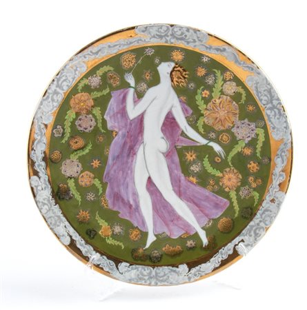 PIETRO MELANDRI (Faenza 1885 - 1976), Piatto con figura femminile danzante con decori floreali policromi e dorati