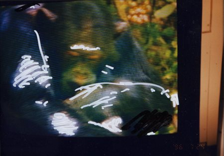 MARIO SCHIFANO (1934-1998) Senza titolo 1990-1997tecnica mista su fotografia...