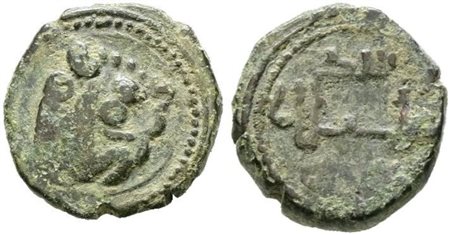 MESSINA. REGNO DI SICILIA. Guglielmo II (1166-1189). Follaro. D/ Testa di leone. R/ Legenda in cufico  AE. 2,14gr BB 
