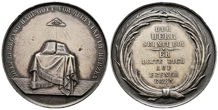 GERMANIA. Medaglia Cresimale con altare e Bibbia Ag. (19,20 g; 38,82 mm).  BB+ 