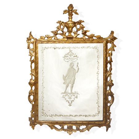 Specchiera veneziana  in cornice dorata a foglia con specchio al mercurio bulinato con personaggio carnascialesco al centro, Venice 18°  secolo