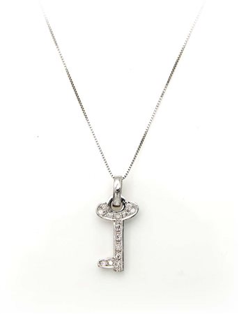 Pendente a chiave in oro e brillanti Oro bianco 750/000. Peso complessivo gr....