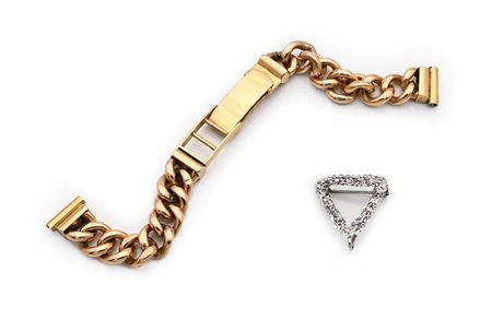 Bracciale e spilla in oro Oro giallo e bianco 750/000. Peso complessivo gr....