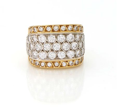 Anello a fascia in oro e brillanti Oro bianco e giallo 750/000. Diamanti in...