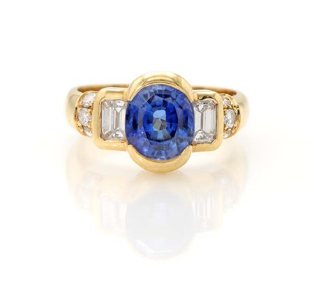Anello in oro, zaffiro, brillanti e baguettes Oro giallo 750/000. Zaffiro in...