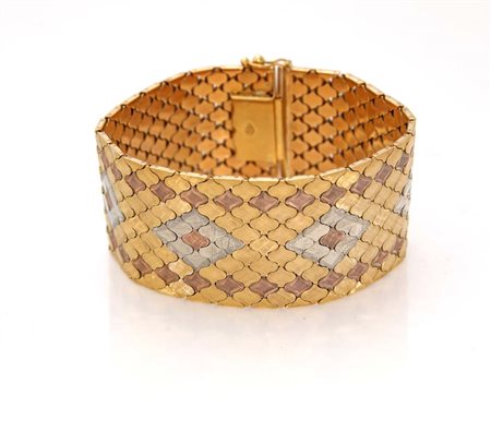 Bracciale in oro, lavorazione a nido d'ape. Oro giallo 750/000. Peso...