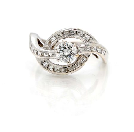 Anello in oro, diamanti in taglio carrè e tondo brillante Oro bianco 750/000....