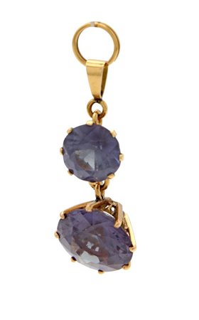 Pendente in oro e ametiste Oro giallo 750/000. Peso complessivo gr. 9,20....