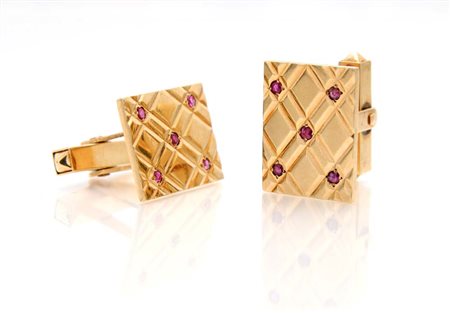 Coppia gemelli in oro e rubini Oro giallo 585/000. Peso complessivo gr. 13,30...