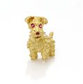 Tiffany, spilla terrier in oro e rubini Oro giallo 750/000. Peso complessivo...
