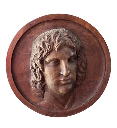 Scultura in legno a basso rilievo, raffigurante Volto maschile, periodo XIX...