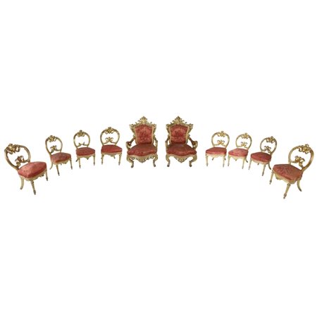 Gruppo di 8 sedie intagliate e dorate - Napoli Fine XVIII inizi XIX secolo...