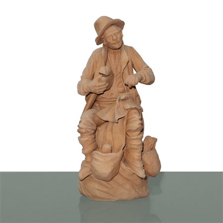 Ceramiche e presepi d'arte  Scarlatella - Contadino che taglia il pane