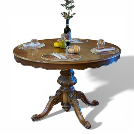 Tavolo rotondo da pranzo allungabile in noce intagliato