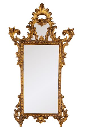 Specchiera in legno intagliato e dorato, in stile