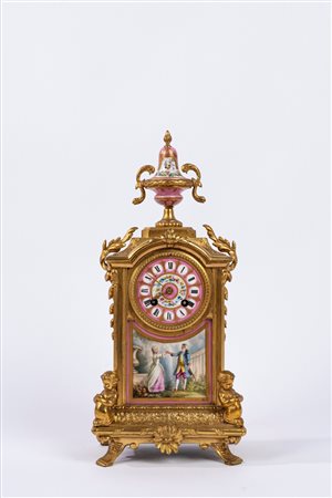 Pendola in porcellana policroma e bronzo 