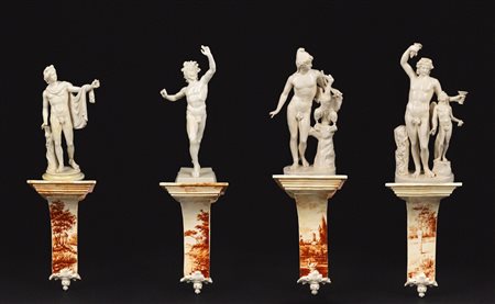 Quattro sculture in maiolica bianca, con base, secolo XIX