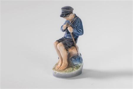 Giovane pescatore in porcellana policroma. Royal Copenaghen, Danimarca, secolo XX