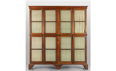 Libreria in noce a due corpi con ante a vetro, 