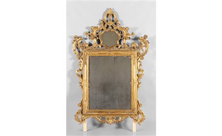 Specchiera in legno intagliato e dorato, cimasa 