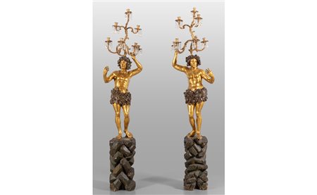 Coppia di sculture in legno intagliato e dorato 