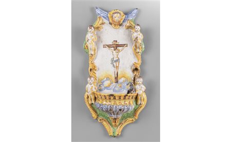 Acquasantiera in maiolica policroma con al centro 
