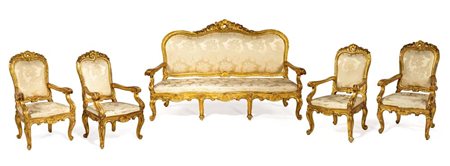 Divano e quattro poltrone in legno intagliato e dorato, Roma, XVIII secolo...