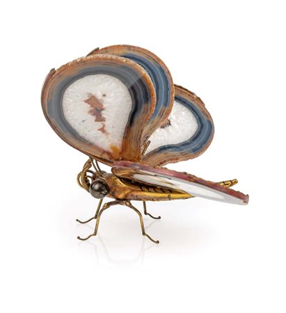Farfalla in metallo dorato con ali realizzate con dischi di geode di agata...