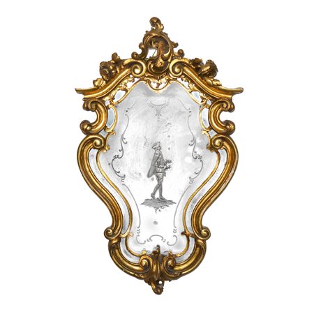 Specchiera decorativa in stile Rococò con figuretta maschile entro cornice dorata riccamente decorata
