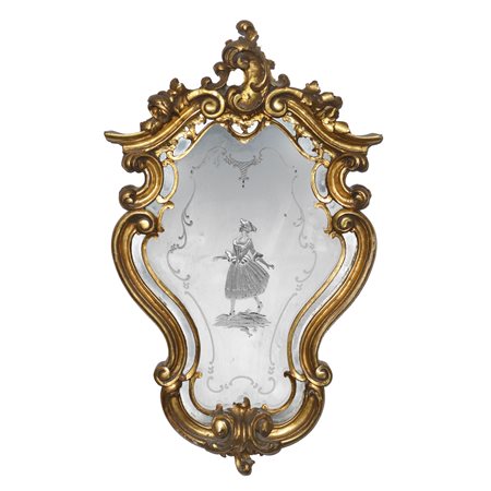 Specchiera decorativa in stile Rococò con figuretta femminile entro cornice dorata riccamente decorata