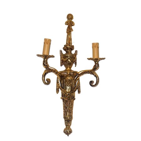 Applique dorato a due luci con decori